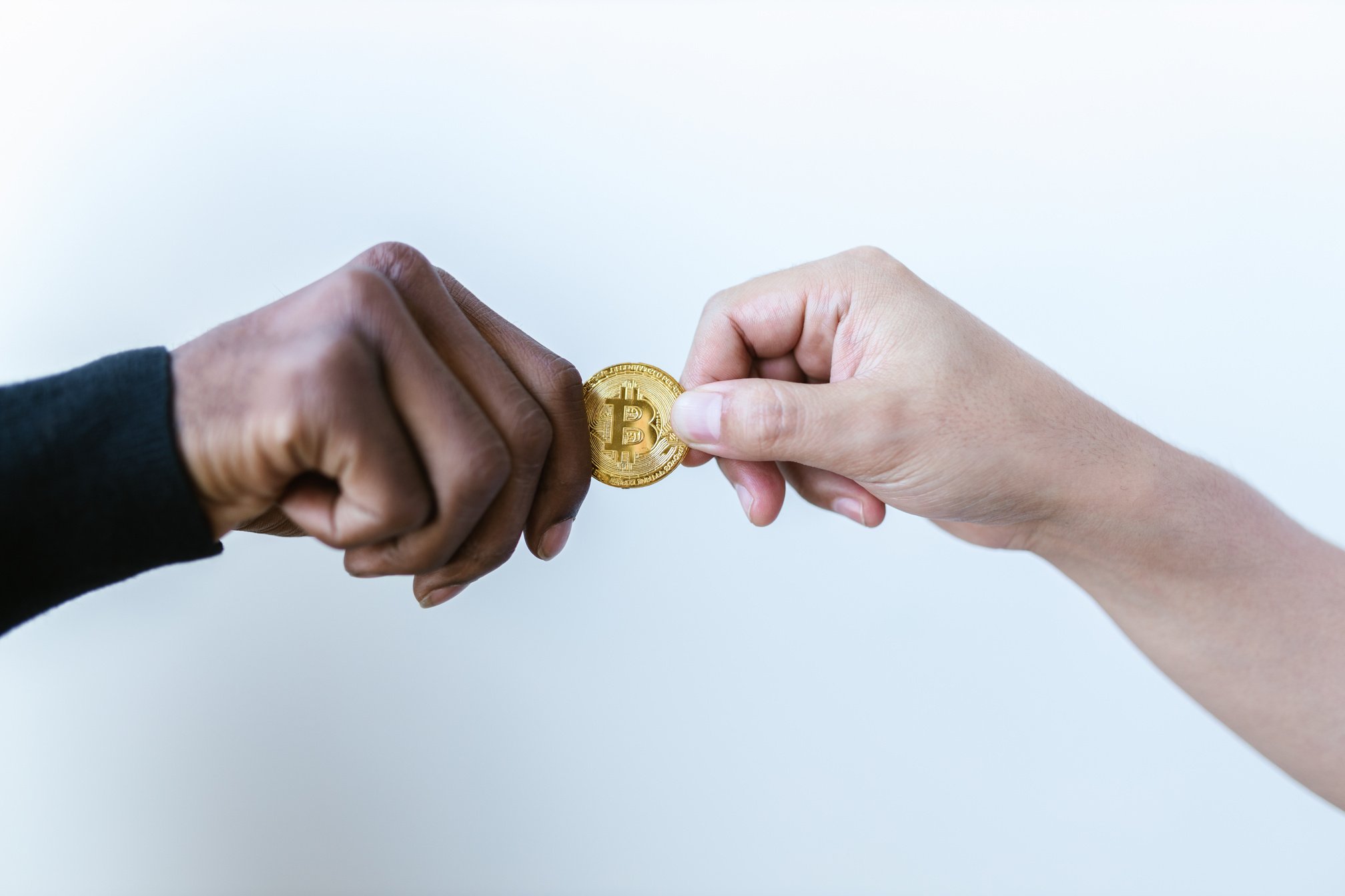 Person Holding Gold Round Coin